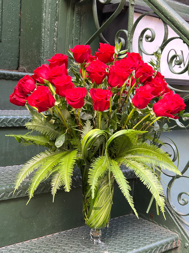 dozen roses in vase