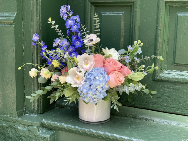 Blue Delphinium with Pink Roses White Orchids and Light Blue Hydrangea