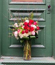 White Hydrangea, Pink and Red Roses, Hints of Anthurium and Branches