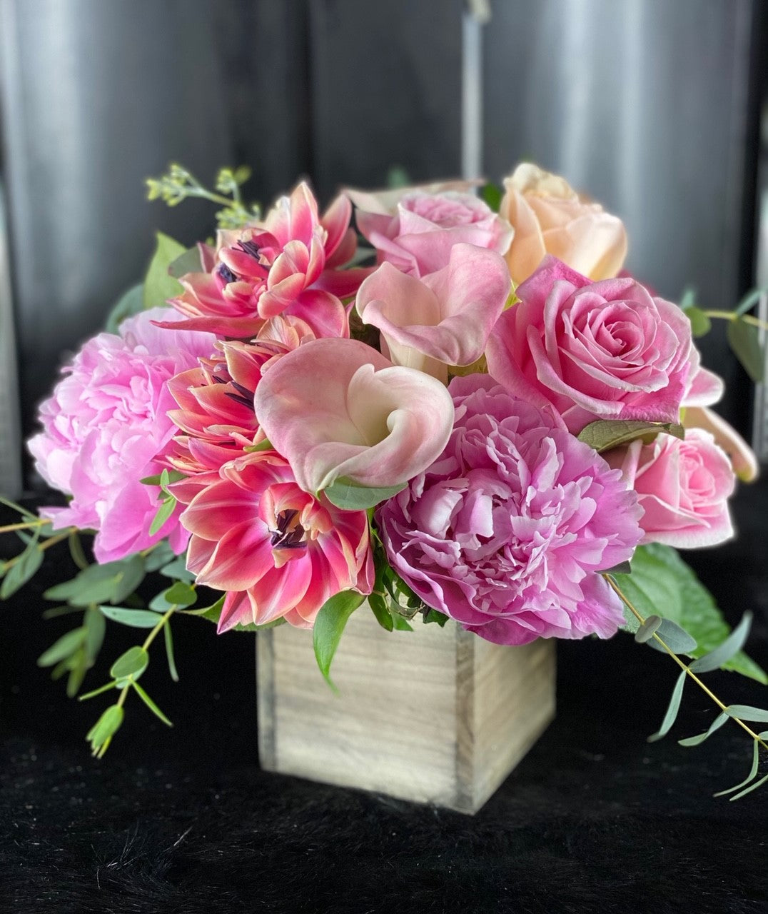tulips, roses, calla lilies, peony, and hydrangea