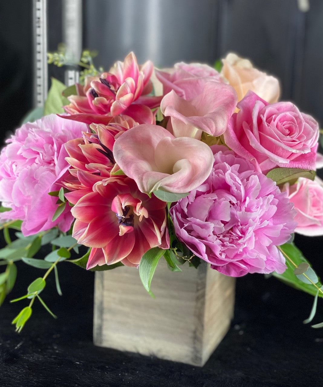 tulips, roses, calla lilies, peony, and hydrangea