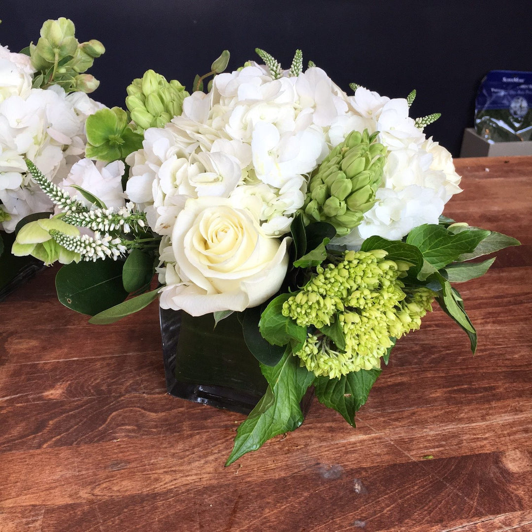 Acid Green and Whites. Mini Green Hydrangea, White Local Hydrangea, White Veronica, White Hyacinth, White Roses, White Lisianthus, Green Heleborous, White Peony