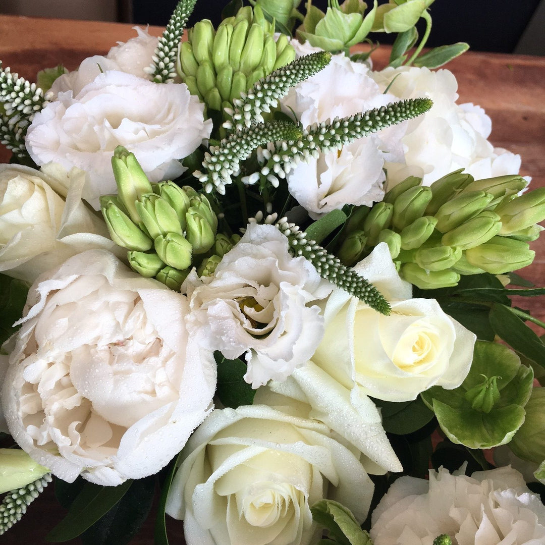 Acid Green and Whites. Mini Green Hydrangea, White Local Hydrangea, White Veronica, White Hyacinth, White Roses, White Lisianthus, Green Heleborous, White Peony