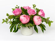 A mix of simple Roses and Peony with free flowing greenery.