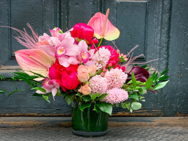 blooms of DAHLIA, tropical anthurium, fragrant hyacinth, calla lily, and cymbidium orchid