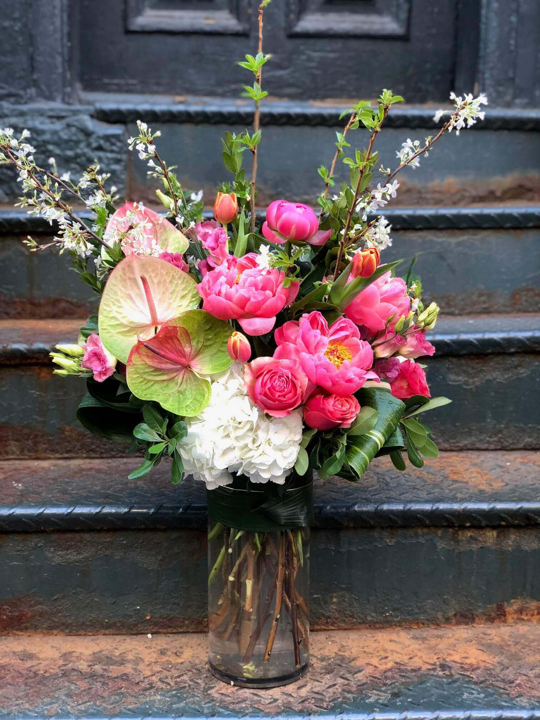 arrangement of Peony, Hydrangea, Lisianthus, Anthurium, Roses, and Tulips