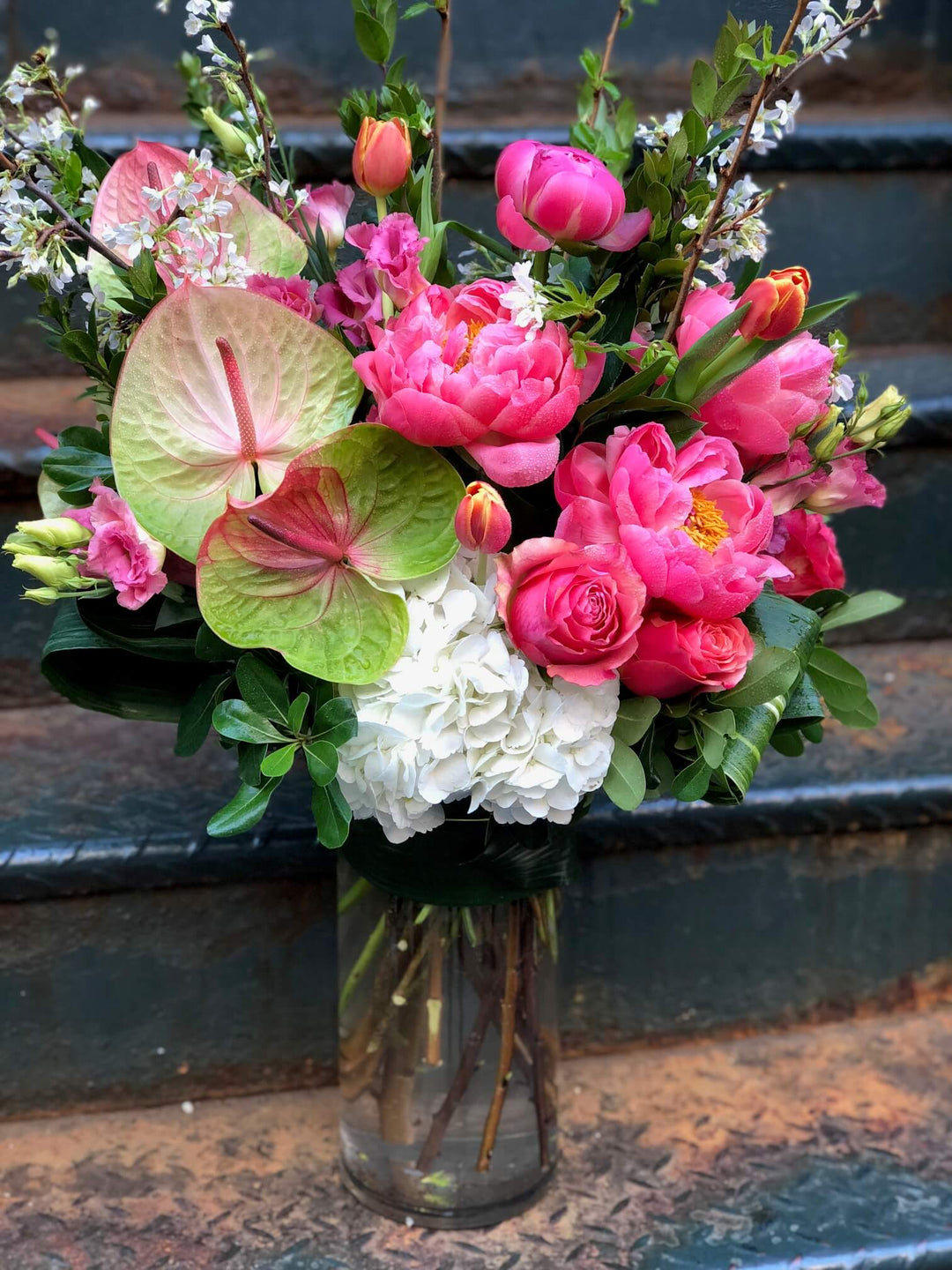 arrangement of Peony, Hydrangea, Lisianthus, Anthurium, Roses, and Tulips