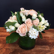 Peach Roses, White Ranunculus, White Spray Rose, White Hyacinth, and White Tulips