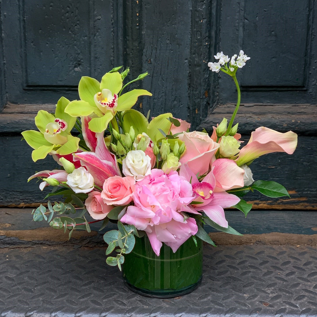 eony, cymbidium orchid, lisianthus, spray rose, fragrant lily, and calla lily