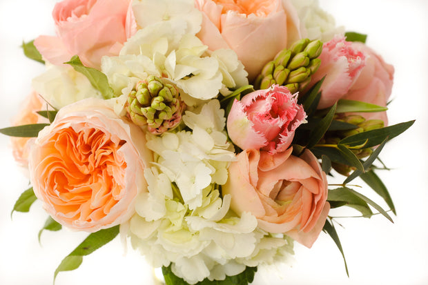 pure white hydrangea, peach fragrant garden roses, fragrant blush hyacinth, and pink confetti tulips