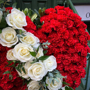 Red Carnations and Red Roses with a White Sash of Roses