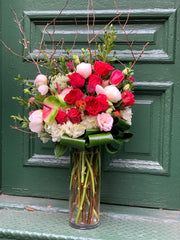 White Hydrangea, Pink and Red Roses, Hints of Anthurium and Branches