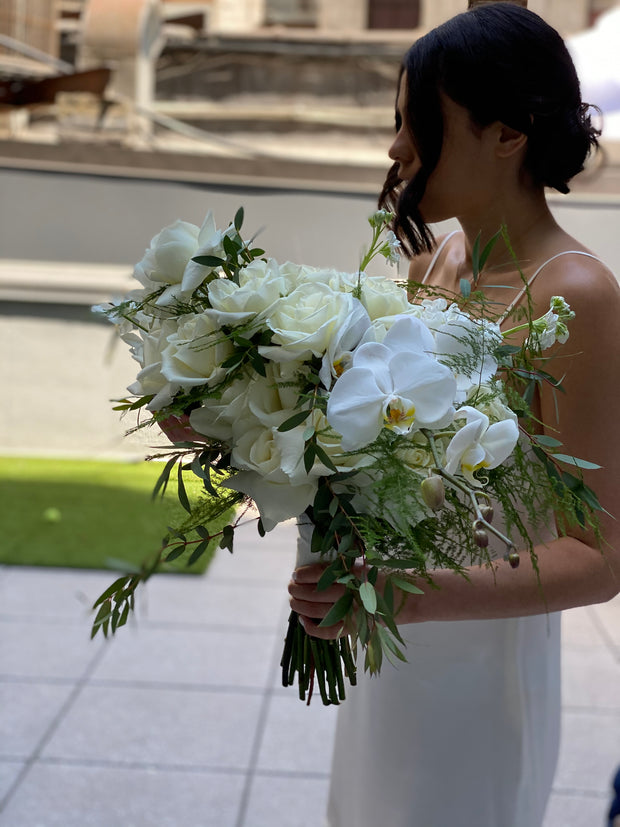 Wedding Bouquet of Garden Roses, Standard Rose, Spray Rose, Orchids, Lisianthus, Stock, and a mix of Garden Greenery
