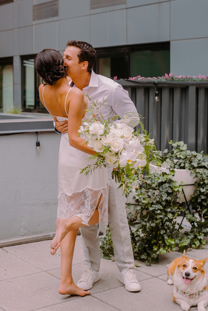 Wedding Bouquet of Garden Roses, Standard Rose, Spray Rose, Orchids, Lisianthus, Stock, and a mix of Garden Greenery