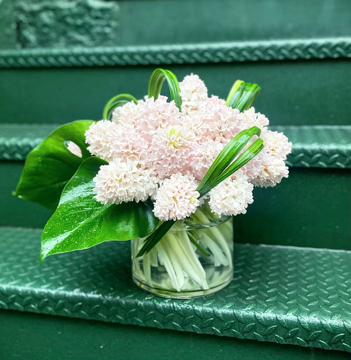 Lush design of hyacinth with modern greenery accents 