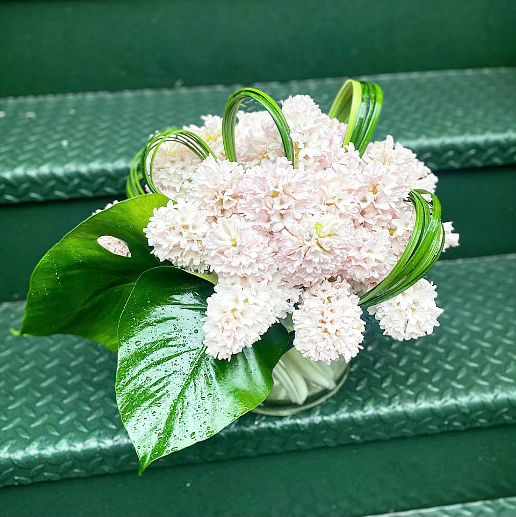 Lush design of hyacinth with modern greenery accents 